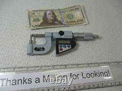 MITUTOYO # 395-733 Digital Micrometer. 184 Round Anvil, 0 1 x. 00005, LN